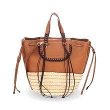 Load image into Gallery viewer, Brown handbag with straw bottom and braided handles on a white background