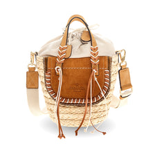 Load image into Gallery viewer, Woven handbag with leather accents on a white background